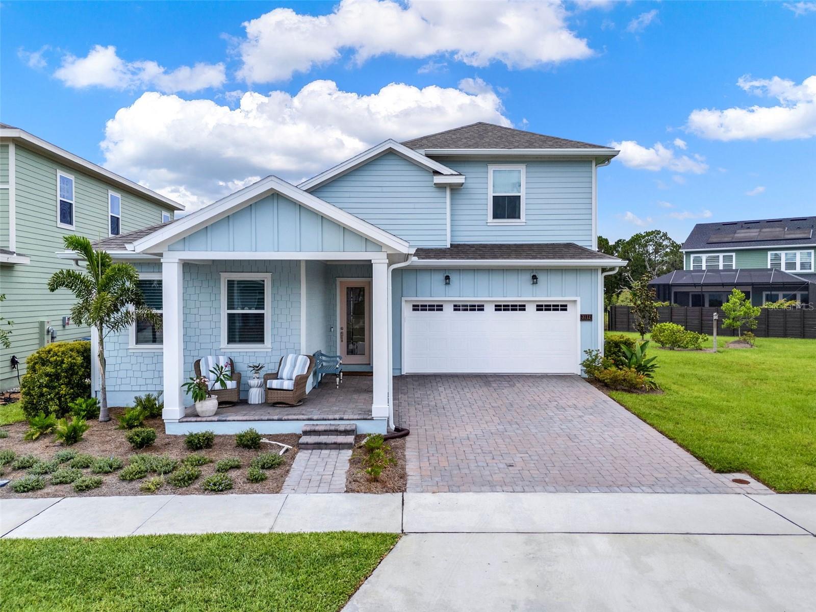 ***Offering thoughtful upgrades and CUSTOM touches you won’t find in current builder inventory, at a price point BELOW what new construction is offering today, this home is a standout in both quality and value!!! *** Welcome to 3112 Ranger Road, a beautifully enhanced home offering just under 3,000 square feet, featuring, FOUR bedrooms, THREE and a HALF baths, a two-car garage, and paid-off solar panels, all situated on a peaceful, green-space-adjacent lot in the sought-after community of Weslyn Park at Sunbridge. As you step inside, you're greeted by a spacious foyer and a calming neutral color palette that provides the perfect canvas for any design style. Just off the entry to the left, two well-appointed secondary bedrooms share a full bathroom, ideally positioned for guests or family. Continue down the wide hallway and the home opens into a bright, beautifully designed living space. The main living areas feature wood-look tile flooring, offering warmth and elegance with the durability of tile, perfect for Florida living. At the heart of the home, the open-concept kitchen, dining, and great room seamlessly connect for effortless everyday living and entertaining. The gourmet kitchen includes an oversized quartz island with bar seating, soft-close cabinetry, stainless steel appliances, custom backsplash, and a pantry with built-in shelving for smart storage. The dining and living areas flow effortlessly to the screened-in lanai, extending your living space outdoors and overlooking the lush, fenced-in backyard with upgraded sod and landscaping. The primary suite, tucked privately at the rear of the home, offers a luxurious retreat with a freestanding soaking tub, an oversized walk-in shower, dual vanities, and a walk-in custom closet. Just off a small hallway near the staircase, a versatile flex room provides the ideal spot for a home office, study, or creative space. Upstairs, a spacious bonus room provides additional living flexibility, while a generous fourth bedroom with its own en suite bath makes for a perfect guest suite or secondary primary retreat. The sellers have added thoughtful custom upgrades throughout the home, including electric window treatments, designer Pottery Barn shades, and custom closet systems in every room. The laundry room has been fully built out with upper and lower cabinetry, solid surface countertops, and a farmhouse sink, creating a stylish and functional space. Other highlights include paid-off solar panels, a modern glass front door that brings in natural light, gutters, and black metal fencing to enclose the beautifully landscaped backyard. Located in Sunbridge, a nature-rich, master-planned community spanning over 28,000 acres, residents enjoy scenic trails, a neighborhood K–8 school, regular community events, and the soon-to-open marina village with waterfront dining, shopping, and a resort-style pool complex. This home is a rare combination of elegance, thoughtful upgrades, and community living, schedule your private showing today and see everything this stunning home has to offer.