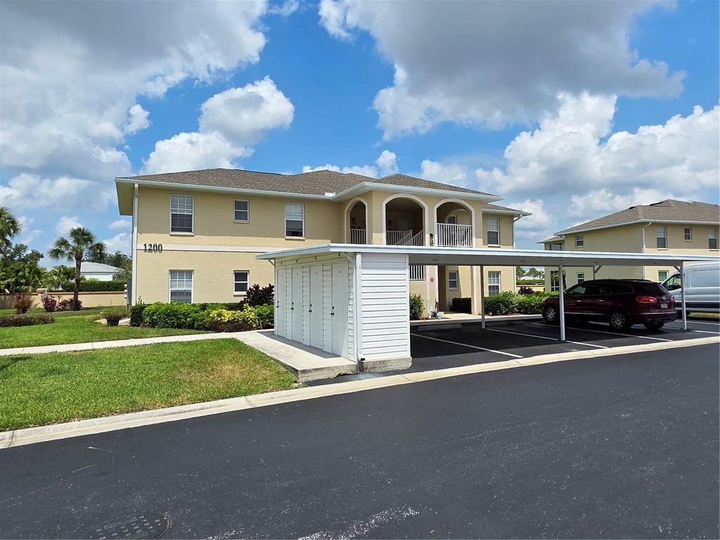 Photo of 5800 Sabal Trace Drive #1201, North Port, FL 34287 (MLS # C7509701)
