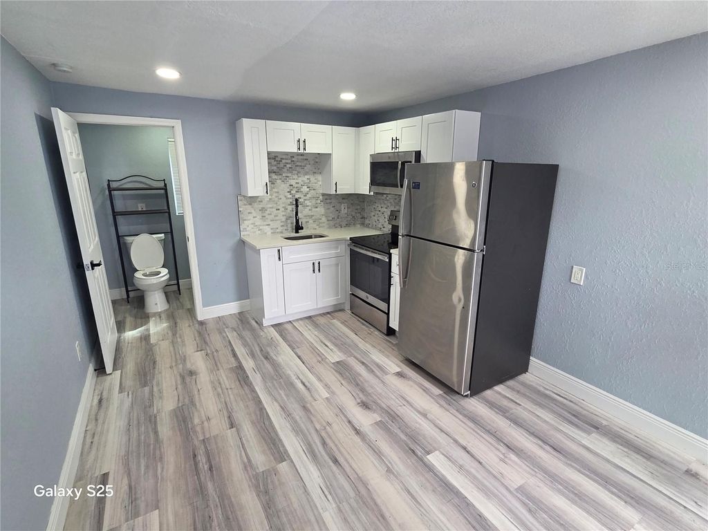 Photo of 420 Auburn Drive, Daytona Beach, FL 32118 (MLS # O6400128)