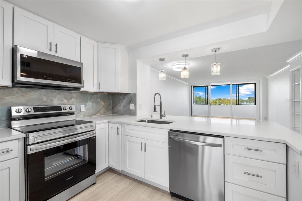 Photo of 2618 Cove Cay Drive #206, Clearwater, FL 33760 (MLS # TB8498888)