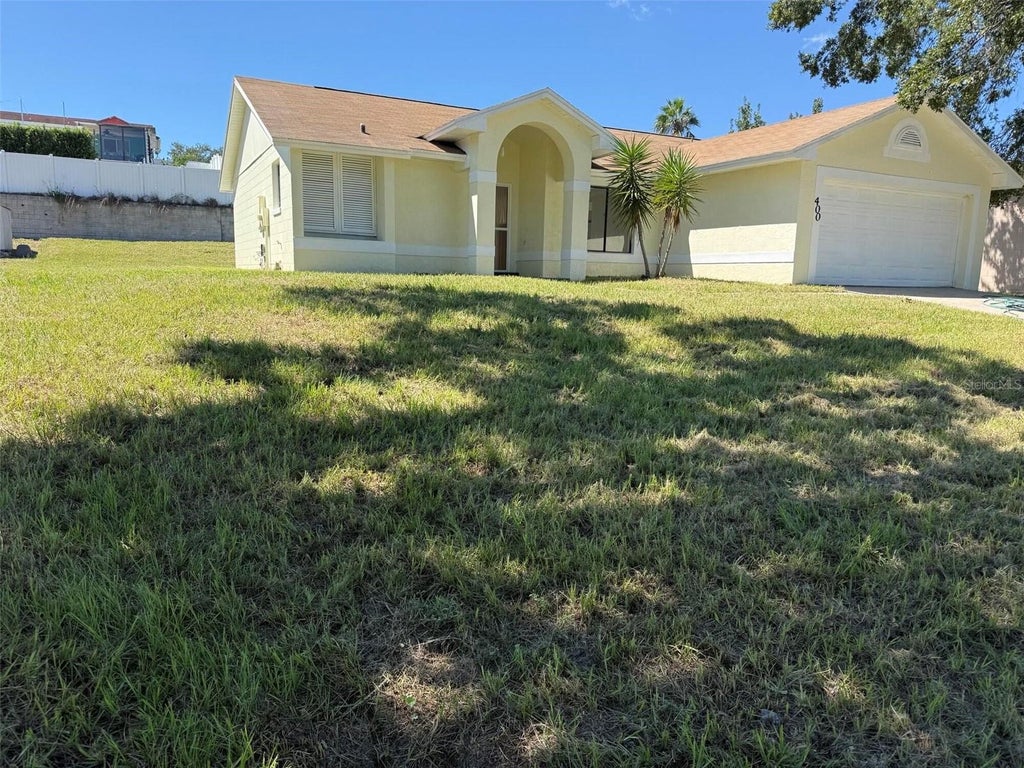 Photo of 400 Ashbourne Drive, Orlando, FL 32835 (MLS # O6445904)