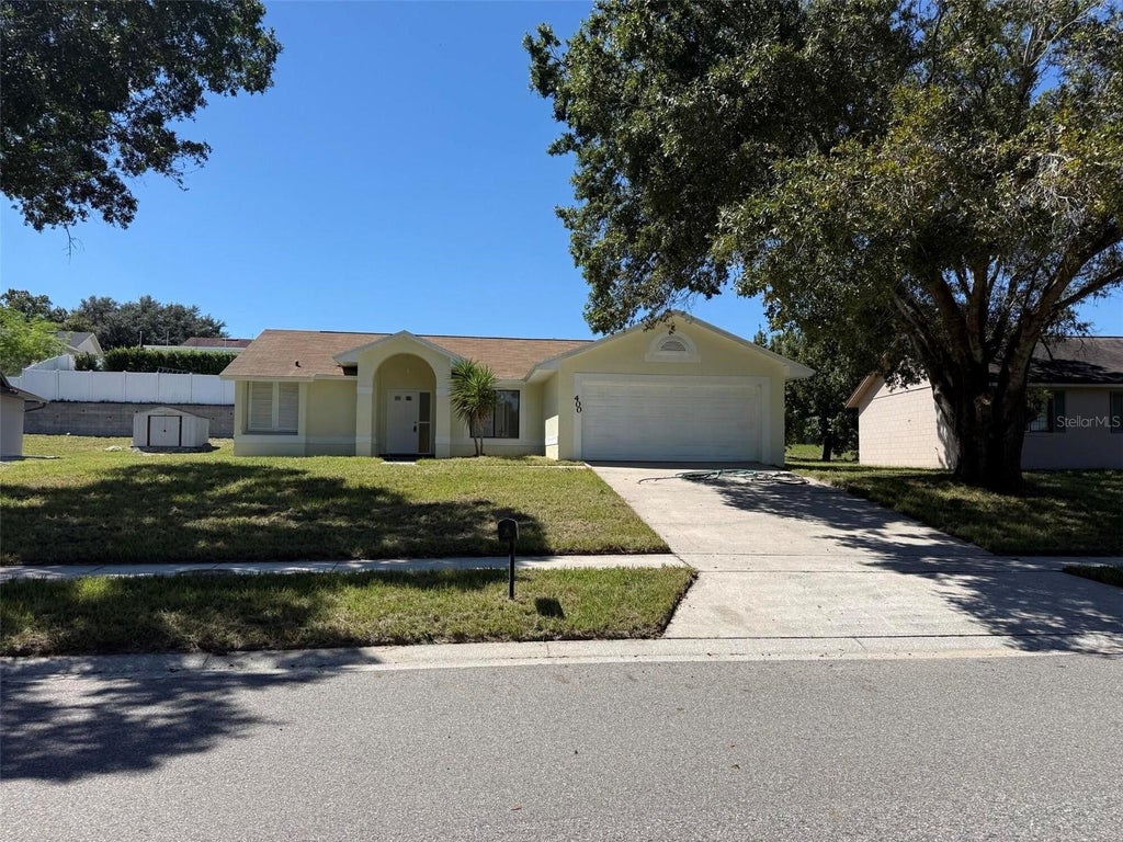 Photo of 400 Ashbourne Drive, Orlando, FL 32835 (MLS # O6445904)