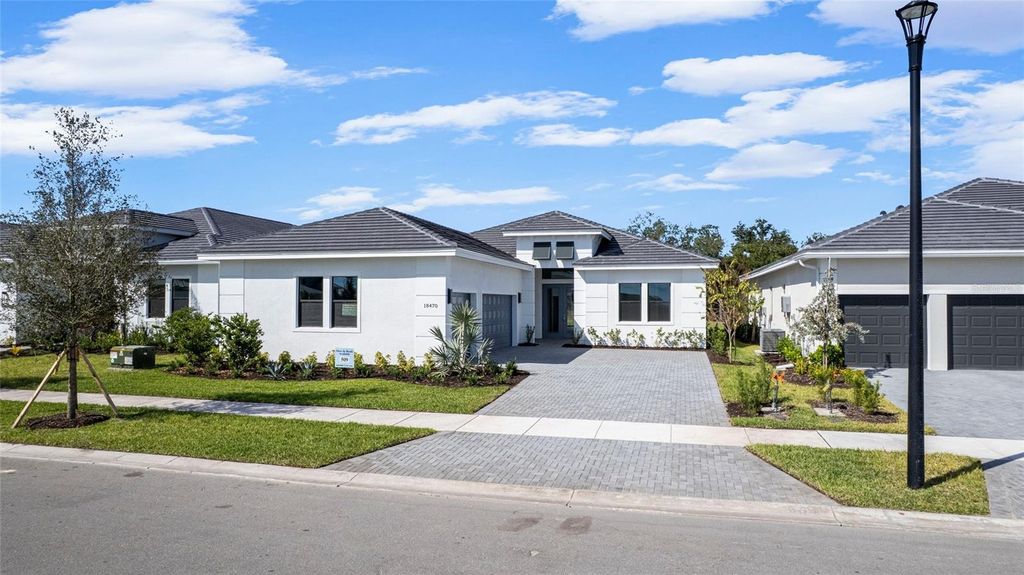 Photo of 4984 Fairhope Circle, Lakewood Ranch, FL 34211 (MLS # W7880699)