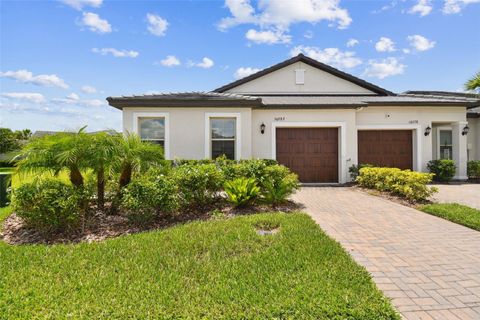 Photo of 10282 Echo Dock Loop, San Antonio, FL 33576 (MLS # TB8399134)
