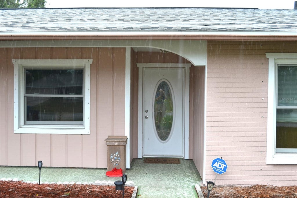Photo of 6496 Toledo Road, Spring Hill, FL 34606 (MLS # W7888004)