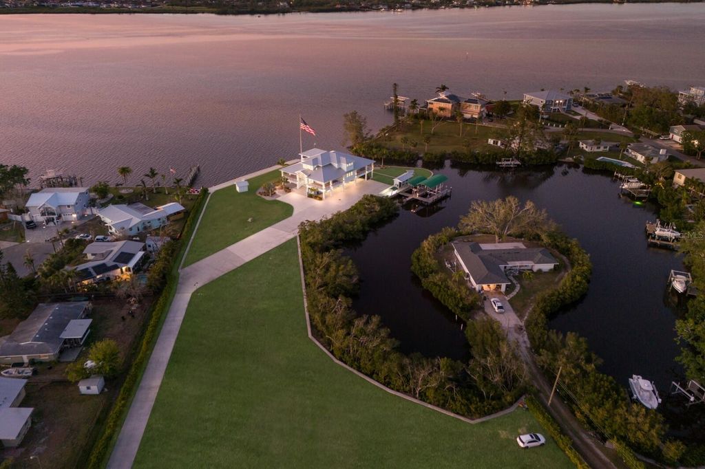 Photo of 327 Riverpoint Drive NE, Bradenton, FL 34208 (MLS # A4645846)