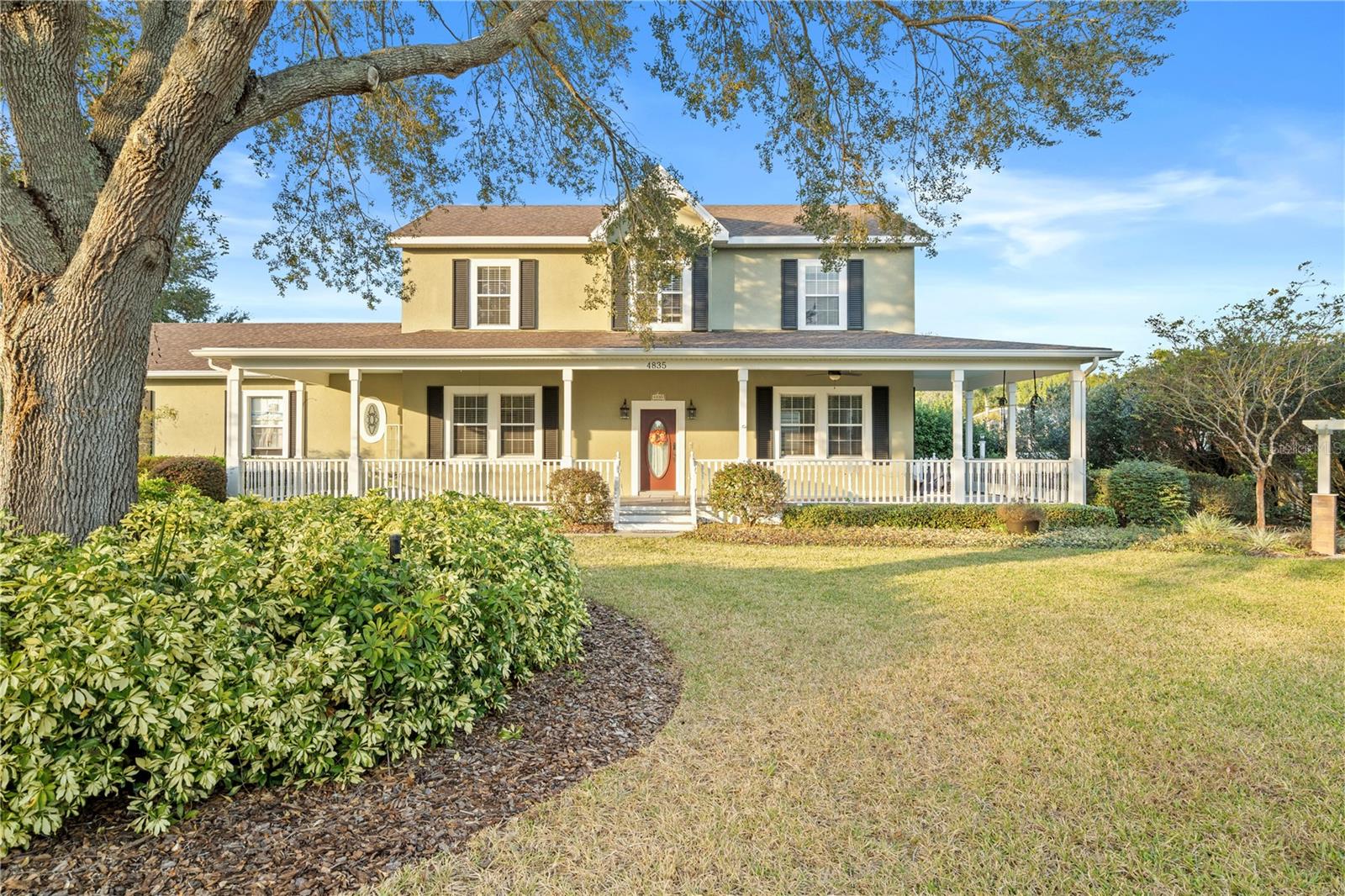Come take a look at this meticulously maintained two-story country home with rap around front porch, where charm and comfort abound on a huge property! Outside, the property offers a saltwater pool, perfect for cooling off on warm days and entertaining company. Storage sheds provide practical solutions for outdoor equipment and tools, keeping your property organized. The fully fenced acre of land offers privacy and a secure space for various outdoor activities. This house is perfect for executive entertainment, as it has a very long driveway for guests and space for your RV or boat! The landscaping, adorned with mature trees, adds to the property's beauty and provides shade and tranquility but not far from all of the stores and restaurants. The home is nestled in the highly desirable community of Runnymede Oak, known for its picturesque old oak trees and an array of gorgeous homes. When you step inside, you'll immediately be drawn to the heartwarming living room space, complete with a fireplace that adds a touch of coziness to the ambiance mixed with a luxurious feel! The inviting gourmet kitchen with brand new high end appliances, thoughtfully designed with ample storage to cater to your culinary desires. There is an indoor laundry room and a half bath on the main floor that offers practicality for guests. The newly finished air-conditioned garage is perfect as a guest room, in law suite, or office! Upstairs, includes a spacious master bedroom with walk-in closets and an elegantly appointed bathroom that was designed with great taste. The two guest rooms provide comfortable spaces for family members or guests, and a guest bathroom ensures everyone's needs are met with convenience. The location couldn’t be more convenient as you a close to popular lakes, parks, dining, the airport, and medical facilities! This country oasis won’t last long so book your tour with us before it’s gone!