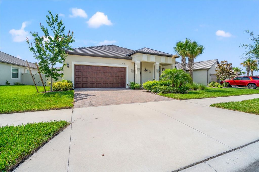 Photo of 31665 Magna Gulf Loop, San Antonio, FL 33576 (MLS # TB8409776)