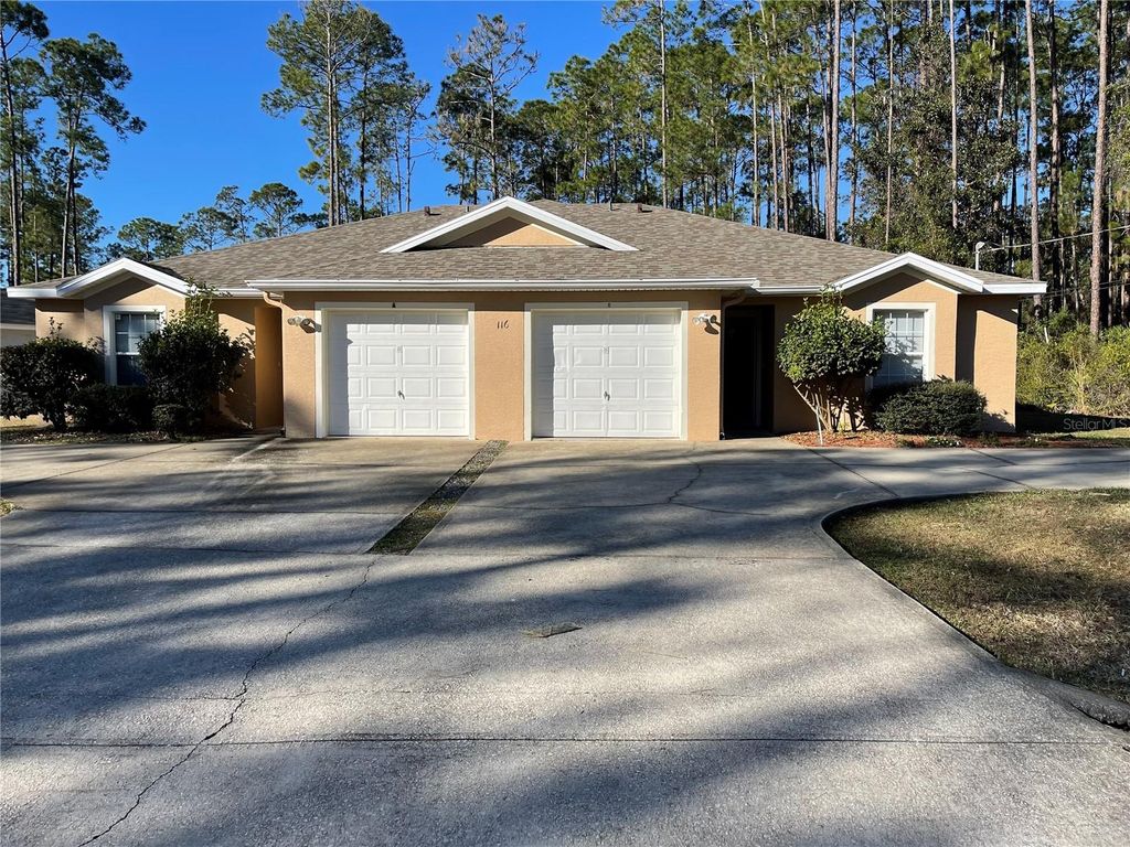 Photo of 116 Wellwood Lane #B, Palm Coast, FL 32164 (MLS # FC317931)