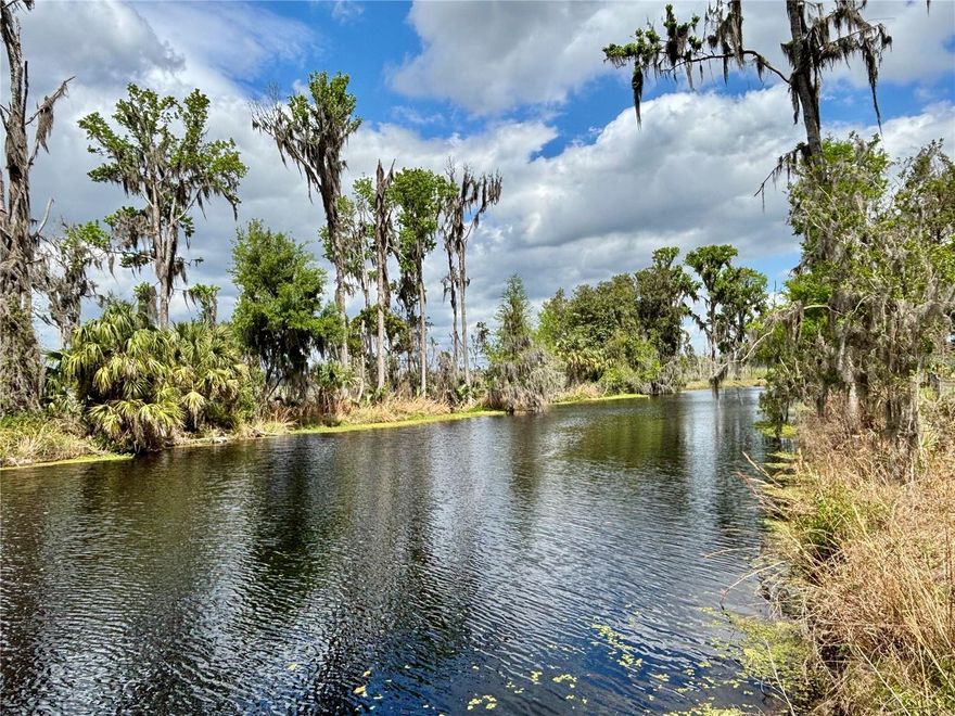 Serene Nature Retreat on 3 Acre Waterfront Property  – $267,500

Nestled on a sprawling 3 acre lot, this unique property offers the perfect blend of natural beauty and outdoor adventure. With 120 feet of cleared frontage on a tranquil canal that extends to Little Orange Lake, you'll have direct access to peaceful waters and stunning views. The canal frontage has a wooden dock that is perfect for fishing, relaxing, and soaking in the surrounding wildlife and serene atmosphere.

The property is shaded by an abundance of native Florida trees, including majestic oaks, palms, and striking magnolias, creating a lush, private oasis. Enjoy having a variety of fruit trees including orange, grapefruit, and persimmon trees.  Additional utility shed built in 2024 -excellent for storage.  Whether you’re enjoying the open wooden deck with canal and lake views or exploring the expansive grounds, you'll be surrounded by the beauty of nature at every turn.

The front 1 acre property has a converted shed that offers convenient overnight accommodations, making this the perfect weekend getaway or vacation home. The property is also equipped with a well and septic system, adding to its appeal as a self-sufficient retreat. Irrigation system is an added feature to this thoughtfully designed property. Create a new homesite or embrace the minimalist living.  The property extends through the canal to cross over more land to additional lakefront property....let the adventure begin.

Located just a short drive from Gainesville, you’ll be able to attend all the University of Florida games and events, while still enjoying the peace and quiet of country living. With easy access to Ocala and Palatka, this property is ideally situated for those who enjoy a mix of outdoor recreation and urban conveniences.

Priced at $235,000, this is a rare opportunity to own a piece of Florida paradise. Price of property without tiny home available at $179,000. Don’t miss out on this waterfront gem!