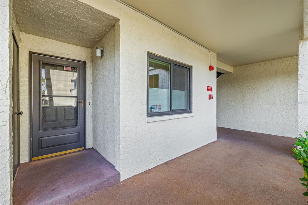 Photo of 700 Starkey Road #311, Largo, FL 33771 (MLS # TB8465577)