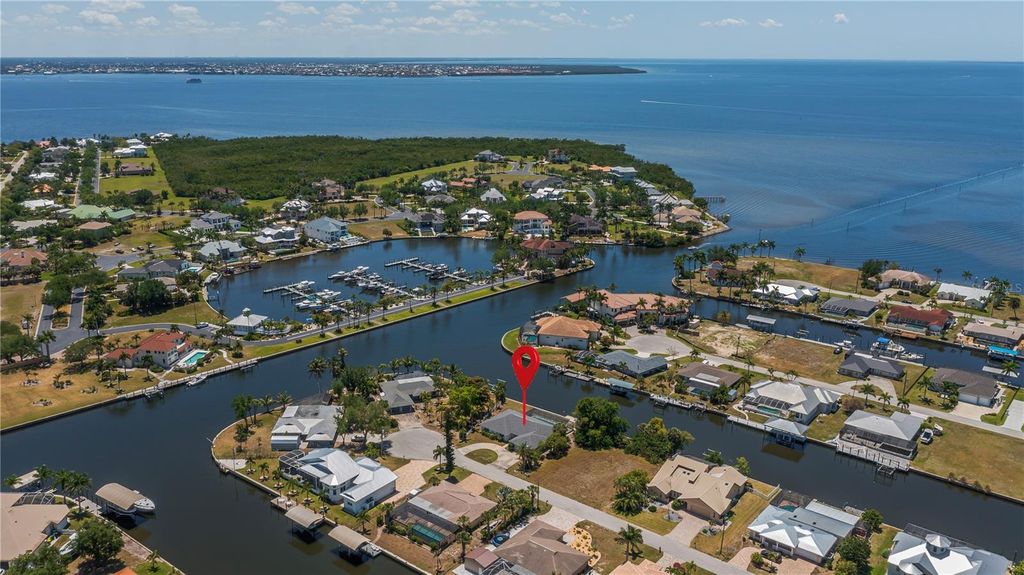 Photo of 137 Sinclair Street SE, Port Charlotte, FL 33952 (MLS # C7525617)