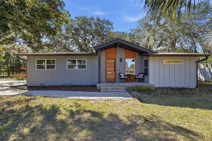 This mid-century modern Sanford charmer has been completely remodeled with a top-to-bottom renovation. Thoughtful new additions bring the total living area to 1,876 square feet, while a newly added front porch enhances curb appeal and preserves the home’s distinctive mid-century style. Inside, newer contemporary kitchens and bathrooms combine style with functionality. The original oak hardwood floors have been beautifully restored, blending classic character with a fresh modern finish. Newer doors and trim have been installed throughout.
All major systems are newer, including plumbing, air conditioning, and electrical. The home features Low-E windows and doors, spray foam insulation for efficiency, and an impressive new metal roof designed for durability and energy savings. It is connected to city water and includes a newer septic system. Set on nearly a quarter-acre lot, the property offers a lovely tree canopy and classic Old Florida charm. The location provides exceptional convenience with Seminole County schools, easy access to SR-417, minutes from downtown Sanford, and close proximity to the Lake Jesup boat launch. Best of all, there are no HOA restrictions.
Don’t miss your chance to be among the first to see this fantastic offering!