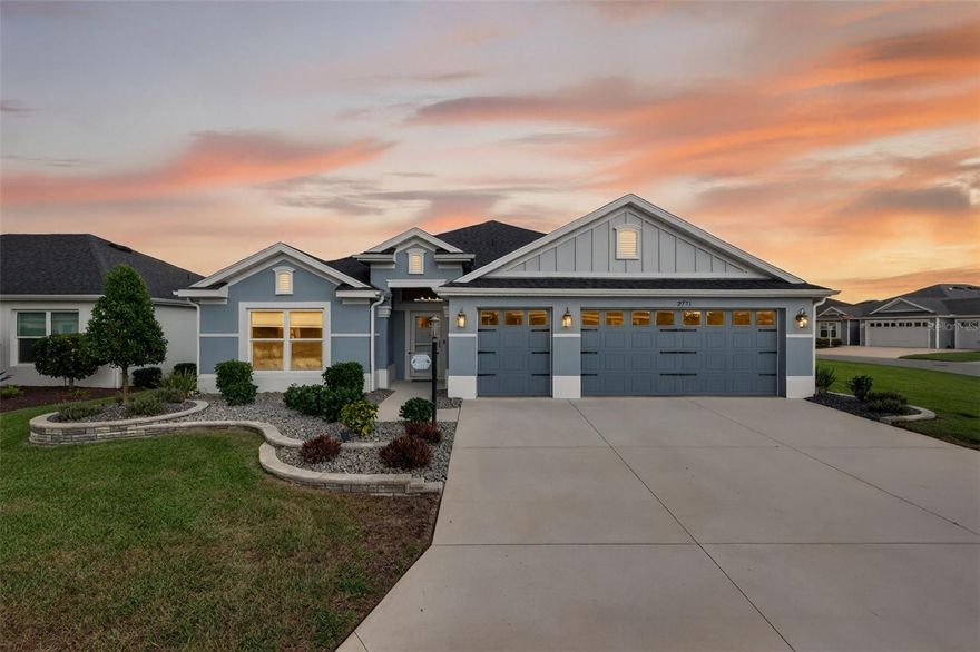 STUNNING, BLOCK and STUCCO 3/2 IRIS with GLASS ENCLOSED, CLIMATE-CONTROLLED LANAI and EXPANSIVE, OVERSIZED 618sf TWO CAR + GOLF CAR garage on LARGE CORNER LOT with ROOM FOR A POOL in the highly desirable Village of Richmond! JUST MINUTES from Brownwood Paddock Square! Built in 2022, this nearly NEW home offers LOW-MAINTENANCE peace of mind with MODERN DESIGN! Enhanced tiered hardscaping, stoned landscaping beds, and an entry door with large transom welcome you in to a well-lit and GENEROUS foyer boasting HIGH CEILINGS and a convenient ENTRY CLOSET. The EXPANSIVE open concept of the living, dining, and kitchen showcase GORGEOUS, WOOD-GRAIN LUXURY VINYL PLANK FLOORING and HIGH VAULTED CEILINGS creating a SPACIOUS and VOLUMINOUS main living area. From the living room, sliding glass doors invite you in to the 29’ x 13’, GLASS ENCLOSED, CLIMATE-CONTROLLED LANAI with MINI-SPLIT. This FABULOUS room is adorned with PLANK TILE FLOORS; FULL PANEL, TINTED sliding glass doors; SOLAR SHADES; and adds an IMPRESSIVE 377sf of BONUS living area to this MAGNIFICENT home! There’s also an adjacent REAR PATIO - perfect for grilling or enjoying the beautiful Florida weather! Back inside, the STUNNING kitchen is a CULINARY HAVEN boasting modern GLACIER GRAY SHAKER cabinetry; QUARTZ countertops; TILED backsplash; CENTER ISLAND with DOUBLE-SIDED cabinets and convenient EAT-IN breakfast bar; under and over CABINET LIGHTING; UPGRADED WIFI STAINLESS appliances with GAS, CONVECTION, and AIR FRYER cooking; and built-in DOUBLE PANTRY with ROLL-OUTS. Adjacent to the kitchen, the dining room, with its VAULTED ceiling and large window, invites NATURAL LIGHT and offers easy access to the lanai through sliding glass doors. The luxurious primary bedroom boasts a TRAY ceiling and a large WALK-IN closet with EXTENDED shelving. Its en-suite bathroom is a retreat in itself, featuring LVP flooring, VAULTED ceiling, SHAKER cabinetry, QUARTZ countertops, DOUBLE sinks, TILED WALK-IN shower, built-in LINEN closet, and separate water closet. Two additional bedrooms and a second bathroom are conveniently located behind a POCKET DOOR near the front of the home, ensuring plenty of PRIVACY for guests or a quiet home office. Bedrooms two and three both feature VAULTED ceilings and built-in closets for ample storage. The second bathroom is well-appointed with LVP floors, SHAKER vanity with QUARTZ countertop, a TILED WALK-IN shower, and a hallway LINEN closet. A CENTRALLY-LOCATED, INTERIOR laundry room offers LVP floors and SHAKER cabinetry for extra storage needs. The EXPANSIVE, OVERSIZED 28’ x 29’ TWO-CAR + GOLF CART GARAGE offers EPOXIED flooring, UNDER-AIR STORAGE closet, wall-mounted foldable table, pull-down stairs with attic access, and a UTILITY SINK with cabinets. DON’T MISS YOUR OPPORTUNITY to make this INCREDIBLE HOME YOUR OWN! The Village of Richmond is JUST MINUTES to Brownwood Paddock Square with shopping, restaurants, and nightly live entertainment; Richmond, Clarendon, and  Lake Okahumpka Recreation Centers; Richmond Pitch and Putt; Water Lily Bridge; Hogeye Preserve; the new Harry and the Natives Restaurant; the ever popular Edna's on the Green; Sawgrass Grove; the up and coming Eastport Town Center; Magnolia shopping plaza;  and SR 44 and CR 466a with a plethora of shopping, restaurants, banks, medical, and more! PLEASE WATCH OUR WALKTHROUGH VIDEO OF THIS EXCEPTIONAL HOME in a FANTASTIC LOCATION and call today to schedule your Private Showing or Virtual Tour!