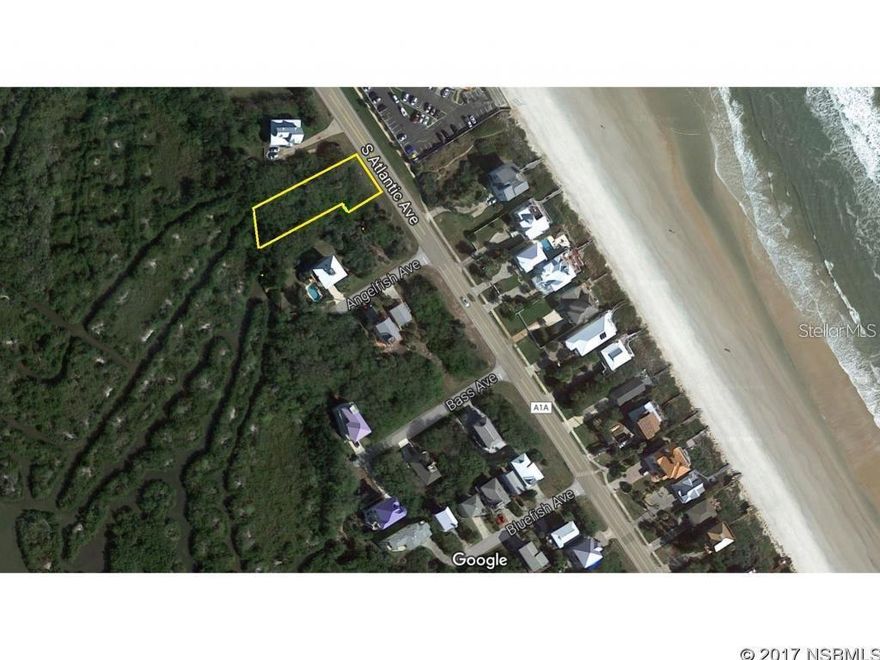 Large waterfront beachside lot with wide ocean views and bordered to the North by County Roadway Easement for maximum privacy (and possible vacate since never built). Lot backs up to the tidal creeks, perfect for kayaking and endless sunsets over the lagoon. The ocean is directly across the street and mostly unobstructed due to a condo parking lot, allowing for some awesome views from 2nd or 3rd level. Beach walkover just a couple short blocks to the south. Close to boat ramps, restaurants and shopping. Come pay in the surf, walk the beach, watch the rockets launch, and more. Survey and soil reports completed. Custom house plans are available (negotiable).  ALL MEASUREMENTS ARE APPROXIMATE. ALL INFORMATION IS ASSUMED ACCURATE BUT NOT GUARANTEED. BUYERS AND THEIR AGENT(S) SHALL VERIFY ALL FACTS THAT ARE DEEMED IMPORTANT TO THEM.