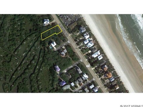 Photo of 5540 S Atlantic Avenue, New Smyrna Beach, FL 32169 (MLS # NS1087766)