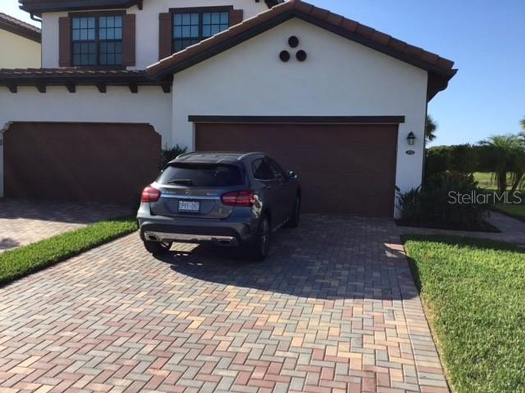 Photo of 12047 Hawthorn Lake Drive #4012, Fort Myers, FL 33913 (MLS # A4689098)