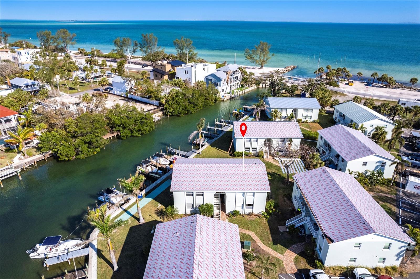 Life’s better on island time—especially when you can own a waterfront condo in the coveted city of Anna Maria at a price this rare!
Dreaming of island life? This is your chance. Tucked away on the water just steps from the sugar-sand beaches, local shops, and breezy restaurants of Anna Maria Island, this 2-bedroom, 1-bath condo is the kind of opportunity that doesn’t come around often.
Wake up to gentle water views, grab your paddleboard or kayak, and set off right from your private dock into Tampa Bay. Even better, the private dock is big enough for boats up to 24 ft. Whether you’re boating to the bay, fishing at sunset, or simply sipping a drink with your feet dangling over the water, your dock is your front-row seat to island living at its core. In the evenings, walk out your front door to the Waterfront restaurant, stroll down Pine Ave, or catch the sunset on the Gulf. This condo puts you at the heart of the island lifestyle.
The space is fully remediated. It is a blank canvas waiting for you to make it your perfect island getaway. Want help bringing your vision to life? We can connect you with local contractors who’ve already worked magic on the island.
New HVAC (2022). New metal roofs (2025). Dedicated parking + guest spaces. Affordable, flexible, and full of potential. Perfect as a cozy getaway, smart investment, or future full-time home.
Anna Maria Island waterfront living, at a price point rarely seen. This is more than a condo—it’s your gateway to the island lifestyle you’ve been dreaming about.