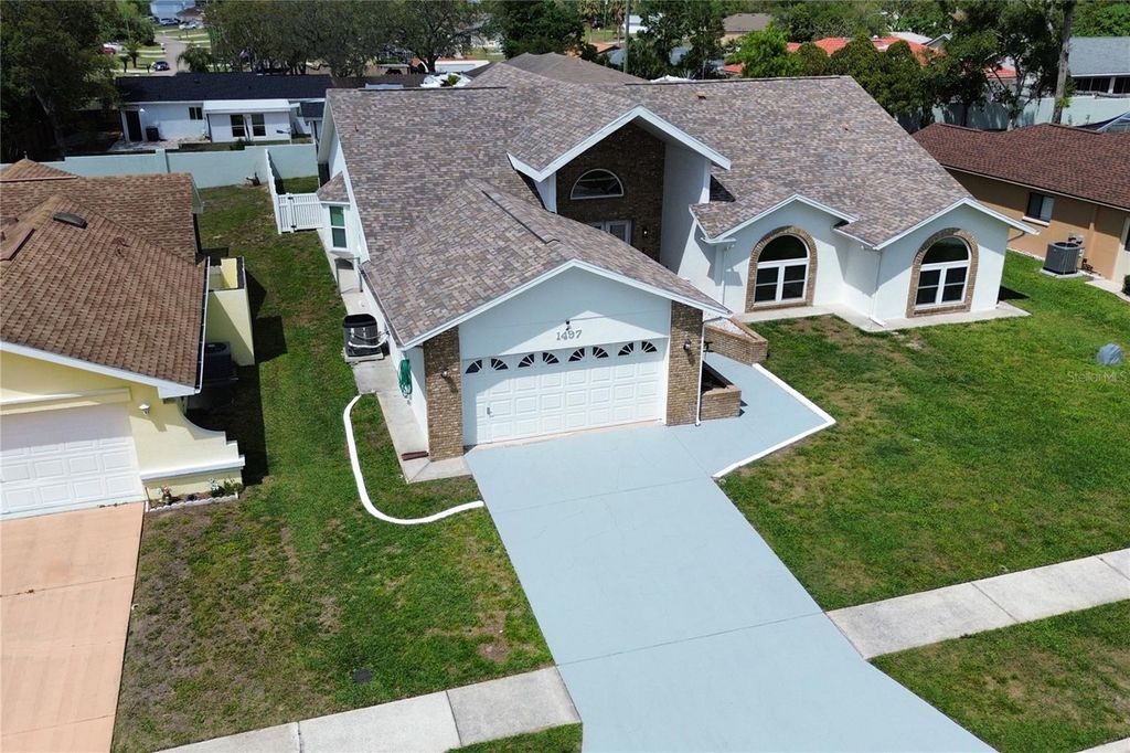 Photo of 1497 Overland Drive, Spring Hill, FL 34608 (MLS # W7884739)