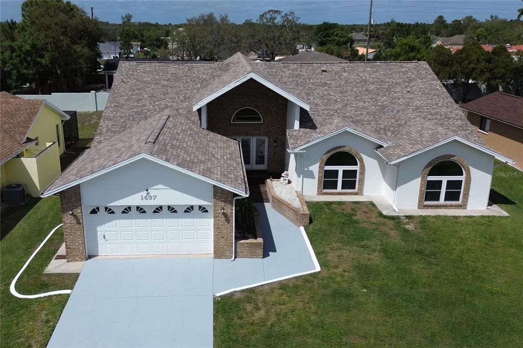 Photo of 1497 Overland Drive, Spring Hill, FL 34608 (MLS # W7884739)