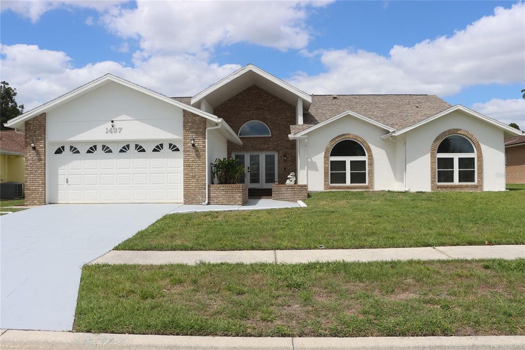 Photo of 1497 Overland Drive, Spring Hill, FL 34608 (MLS # W7884739)