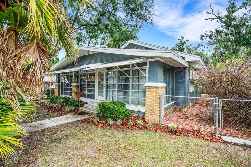 Charming Bungalow in the Heart of Lakeland

Step into timeless charm with this beautifully updated 2-bedroom, 2-bath home, originally built in 1925 and ideally located in the highly sought-after Lake Morton Historic District.

Perfectly positioned for enjoying the Lakeland lifestyle, you’re just a short stroll to Lake Morton, Lake Hollingsworth, Florida Southern College, and vibrant Downtown Lakeland. Set along a picturesque brick street with brick sidewalks, this home offers true historic district appeal.

Inside, this adorable home blends classic character with thoughtful updates. Gorgeous refinished hardwood floors flow throughout, while the updated kitchen features granite countertops, a stainless steel appliance package, and an undermount sink. Just off the kitchen, a sunny morning room provides the perfect spot to start your day.

One of the standout features is the expansive 399-square-foot wraparound sunroom with A/C, filled with natural light from floor-to-ceiling windows and finished with new ceramic tile flooring—ideal for relaxing, entertaining, or creating a flexible living space.

Both bathrooms have been nicely updated, with the second bath offering a stackable washer and dryer along with a Rheem tankless water heater. Major systems including a newer roof, the plumbing and electrical have been updated, providing added peace of mind. The fireplace adds to the home’s charm as a decorative focal point.

Outside, enjoy a private, fenced backyard with a brick patio, a large parking pad for parking, and a detached garage—all situated on a desirable corner lot.

A rare opportunity to own a beautifully updated home in one of Lakeland’s most beloved neighborhoods.