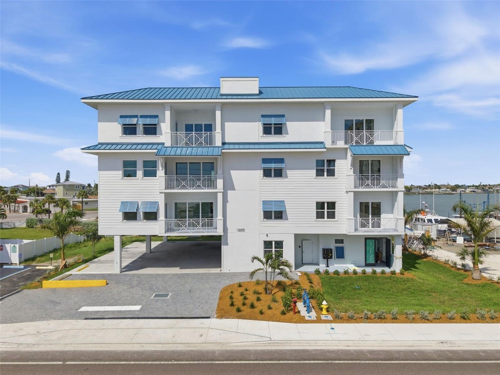 Photo of 13655 Gulf Boulevard #401, Madeira Beach, FL 33708 (MLS # TB8548386)