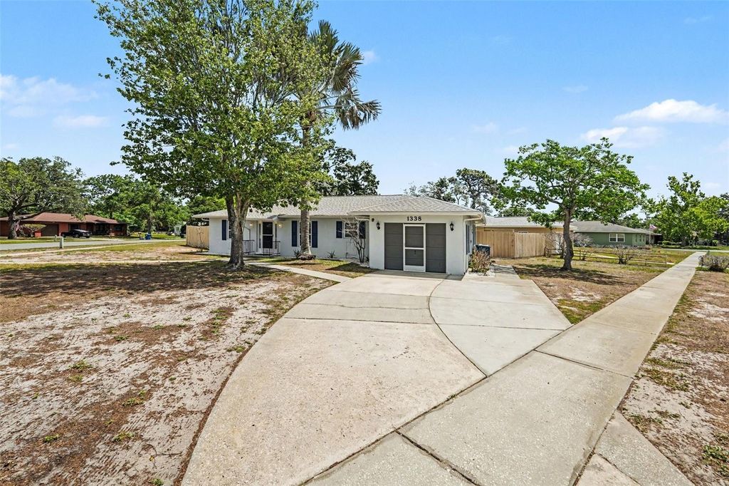 Photo of 1338 Pilgrim Rd, Spring Hill, FL 34606 (MLS # TB8501272)
