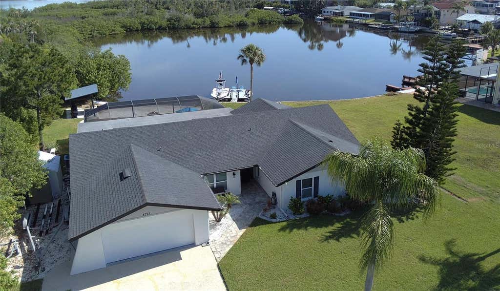Photo of 5717 Seabreeze Drive, Port Richey, FL 34668 (MLS # TB8524705)
