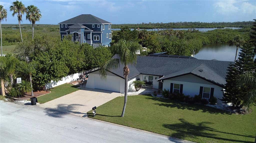 Photo of 5717 Seabreeze Drive, Port Richey, FL 34668 (MLS # TB8524705)
