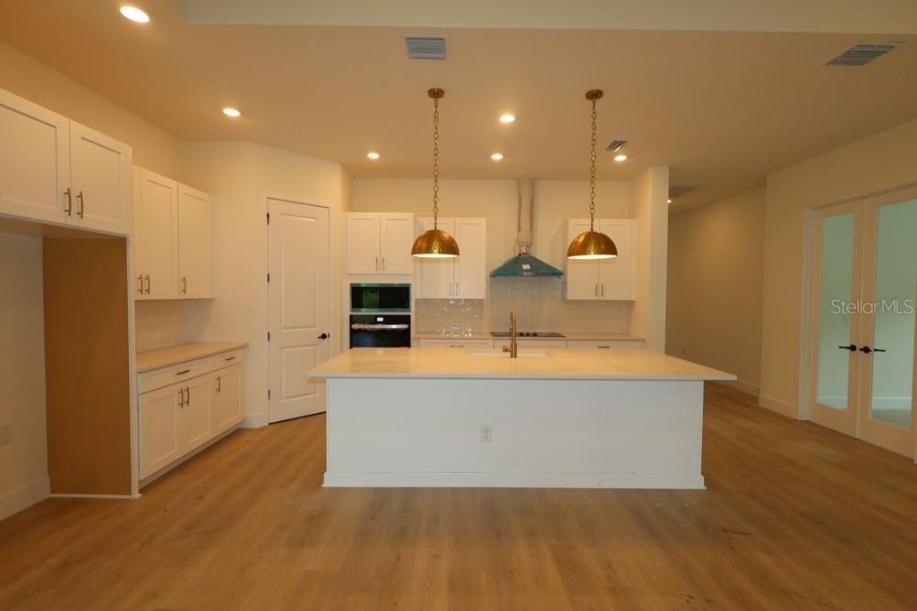 Photo of 31467 Hayman Loop, Wesley Chapel, FL 33545 (MLS # TB8481612)