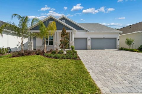 Photo of 31467 Hayman Loop, Wesley Chapel, FL 33545 (MLS # TB8481612)