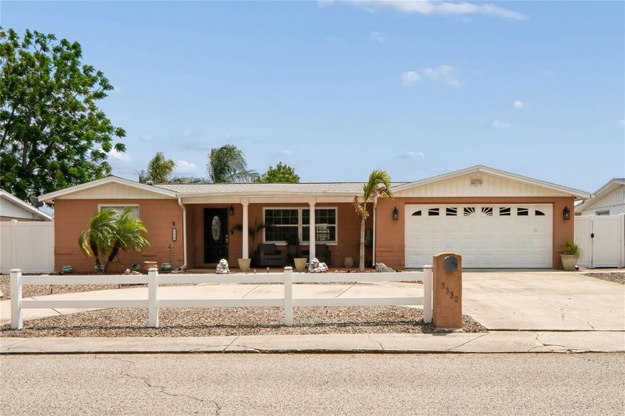 Welcome to 5330 Dove Dr in New Port Richey—an upgraded, move-in ready home offering 1,968 sq ft of comfortable Florida living with major systems already done for you. High and dry- no flood insurance needed here! Zone X. 

Enjoy peace of mind with a brand-new roof, updated electrical panel, newer hot water heater, and energy-efficient tilt-out windows. The 3.5-ton Carrier AC system keeps the home cool, while the garage features its own heating and cooling system, hurricane-rated insulated door, epoxy floors, and a commercial-grade opener—making it a true extension of the home.

Inside, the renovated kitchen includes granite countertops, newer appliances (all under 5 years) and a built-in wine refrigerator. Recessed lighting, crown molding, and chair rail detailing add a polished finish throughout. Both bathrooms have been updated with new copper plumbing, Schluter wall system and the guest bath features an oversized tub.

Step outside to a fully fenced backyard designed for relaxing and entertaining—complete with a pergola, fire pit, 8x10 shed, and a semi-inground pool with updated equipment and color changing pool light. The expanded circular driveway and extensive stone and paver landscaping create a clean, low-maintenance, high-end feel from the moment you arrive.

Centrally located just minutes from Trinity, Tarpon Springs, and Downtown New Port Richey, with easy access to Tampa and Clearwater—both under an hour—this home puts you close to everything while still offering privacy and space.

With security cameras, exterior lighting, and thoughtful upgrades throughout, this home delivers both comfort and confidence.