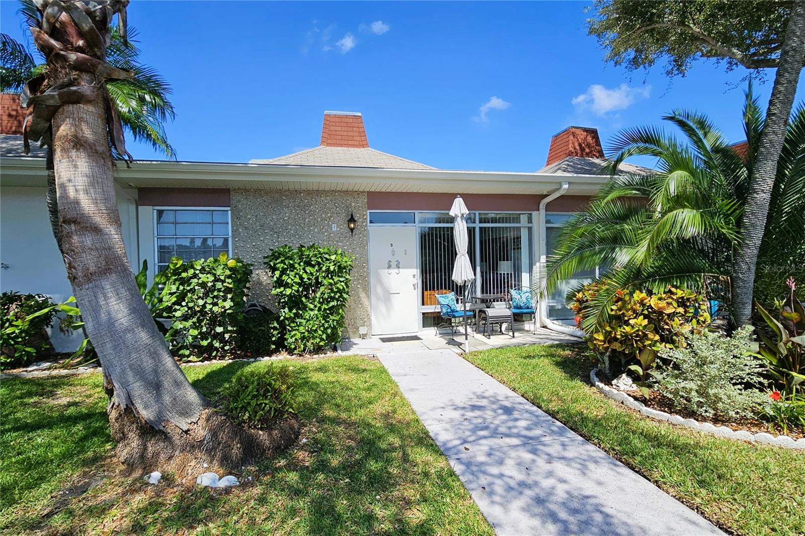 TURN-KEY, 1 bedroom, 1 bath condo in TAHITIAN GARDENS a beautiful GATED 55 & OLDER COMMUNITY. Come see this extra clean fully furnished turn-key unit. Features tropical landscaping, crosscut tile in the living room and kitchen with extra-large floor to ceiling living room windows. Tastefully decorated with tropical paintings and photos. Includes a washer-dryer unit for added convenience. Enjoy the beautiful lake with a beautiful multi-color fountain located directly behind your unit’s building. Just a few minutes’ walk to the heated pool and clubhouses. Tahitian Gardens has many activities including shuffleboard, arts and crafts, a bicycling club, bingo, dominoes, card groups and more. Located off US 19 in Holiday, FL with easy access to shopping and public transportation. Tampa and Clearwater airports are less than an hour’s drive. Walking distance to CVS, Walgreens, and Aldi. Minutes away from Tarpon Springs, the Sponge Docks, and the beach at Howard Park. Very easy to see but shown by appointment. Non-smokers only. FIRST & LAST MONTH’S RENT plus SECURITY DEPOSIT REQUIRED.
