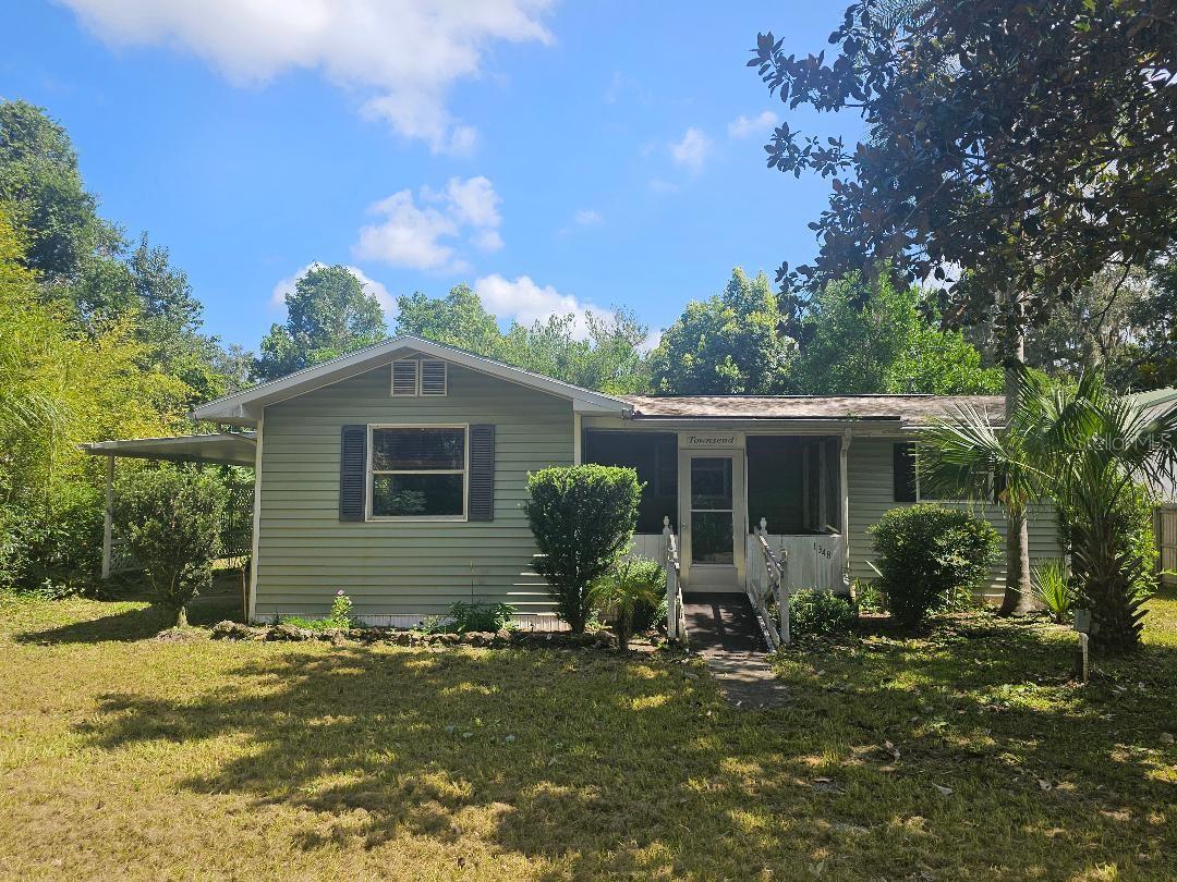 This adorable Cottage is located on paved road with views of the woods and mother nature. This home has so much potential, with real hardwood floors in the living room and some of the bedrooms that just needs to be sanded and sealed to bring out its beauty. Nice large kitchen and an eclosed back porch plus 3 bedrooms & 1.5 baths. All this is situated on a nice large .30 of an acre lot tucked away from all the hustle and bustle. Come check it out. Great potential with a little sweat equity you can turn this house into a home. Perfect starter home or as an investment/rental once it is restored.