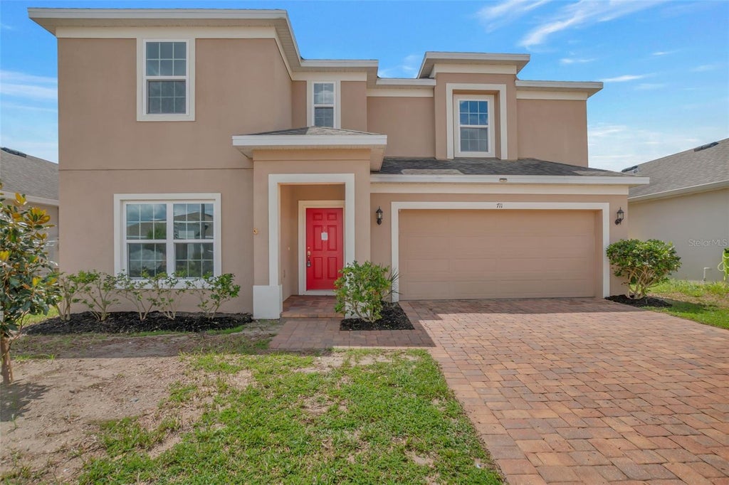 Photo of 711 Benjamin Trail, Davenport, FL 33837 (MLS # O6442240)