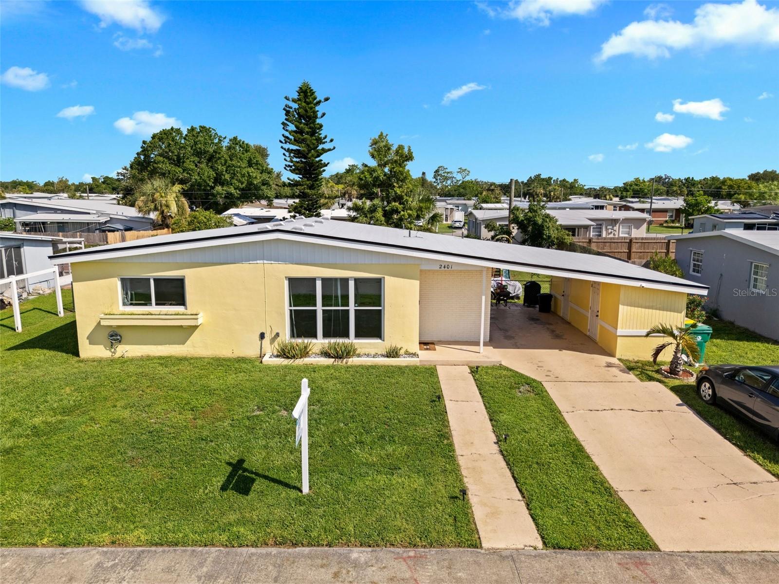 This charming 2-bedroom, 1-bath home is in a convenient location and sits in an X flood zone (so no flood insurance headaches here). Major updates include a new roof (June 2025), updated plumbing (2020), a brand-new electrical panel, and Category 5 hurricane impact windows—basically, it’s built to handle whatever Florida throws at it.
Other perks? A generator plug (because hurricanes don’t cancel movie night), granite countertops, stainless steel appliances, a bright Florida room, indoor laundry (no more garage laundry workouts), and tons of carport storage. The fully fenced yard is perfect for pets, kids, or that garden you’ve been meaning to start.
This home is equal parts cute and capable—come check it out before someone else beats you to it!