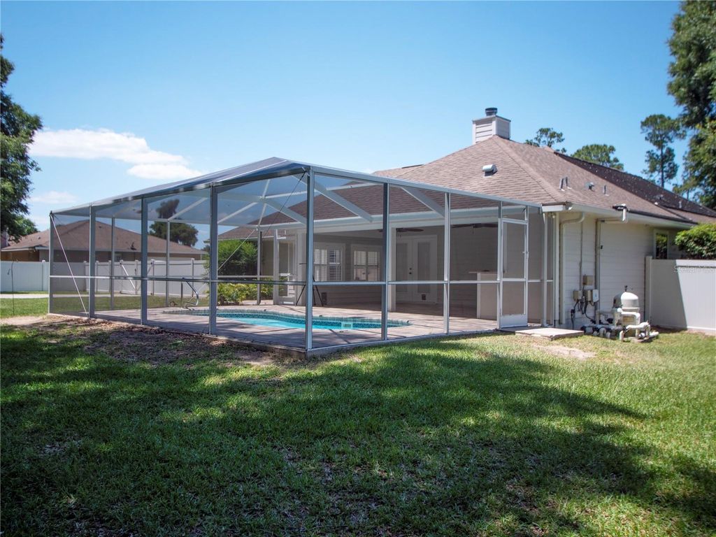 Photo of 1258 NE 51st Loop, Ocala, FL 34479 (MLS # OM727476)