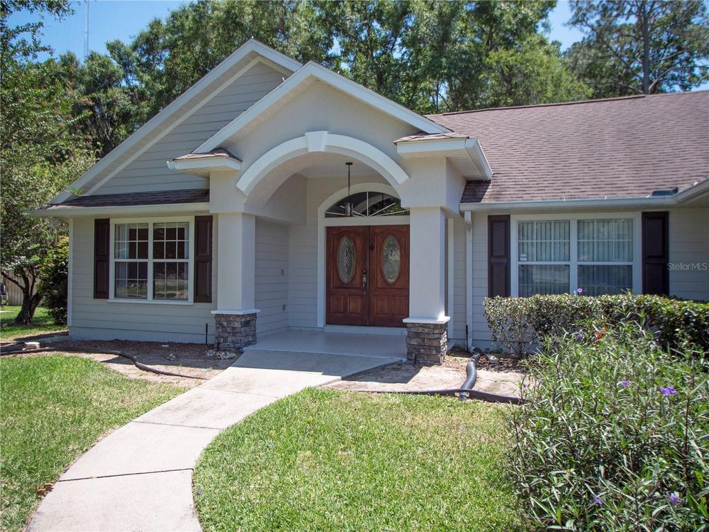 Photo of 1258 NE 51st Loop, Ocala, FL 34479 (MLS # OM727476)
