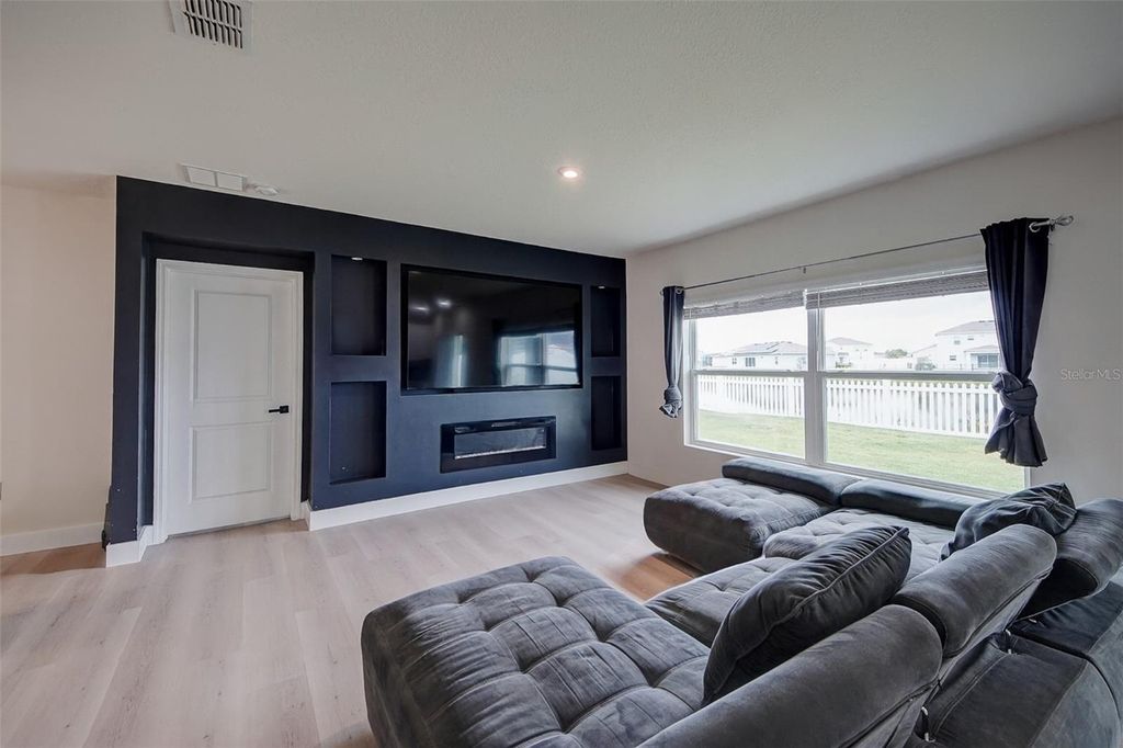 Photo of 424 Quarry Rock Circle, Kissimmee, FL 34758 (MLS # O6322908)