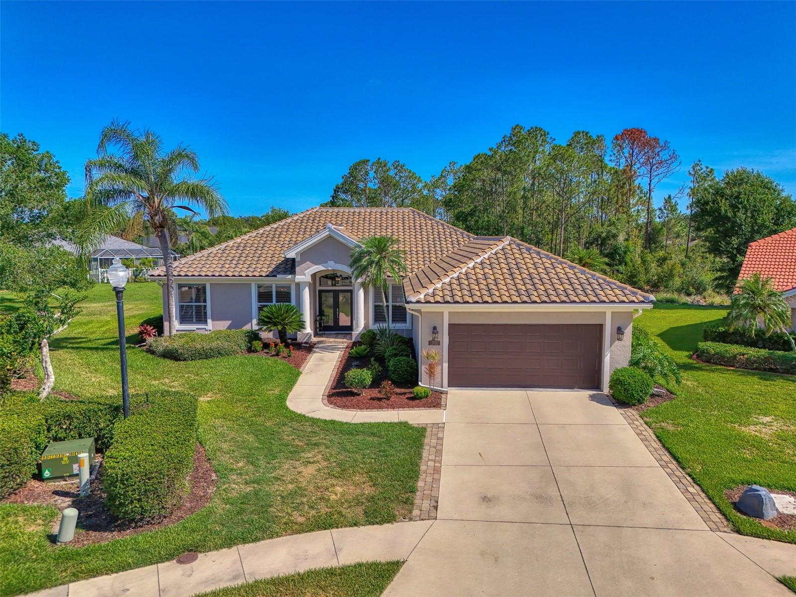 This River Club Pool Home has the Sizzle You see in the New Home Models!! Sick of taking care of that Lawn and Landscaping, then this is the neighborhood for you! Offering, 3 Bedrooms, Den, 2 Bath, 2 Car Garage Nestled on a Cul-de-Sac that Backs up to a Nature Preserve. The Home has Recently been Totally Remodeled. New Tile Roof in 2022, New A/C in 2024, Beautiful Double Glass Front Doors. The Interior has Hi End Hardwood Laminate Flooring with Protective Coating. The Interior Doors and Baseboard Trim have been Replaced. The Kitchen has Granite Countertops with Farmers Stainless Steel Sink, Newer Custom Cabinets with Soft Close Feature, under lighting above and Floor lighting below as well as Newer Appliances.The Bathrooms are upgraded with New Sinks, Stone Countertops, Faucets, Toilets, and Marble Tile Flooring. The Spacious Owners Suite has 2 Walk-in-Closets with all New Custom Organizer Systems, Double Sinks and Makeup Vanity, Walk-in-Shower with Glass Enclosures. All New Lightening Fixtures and Ceiling Fans Throughout. Enjoy Many Days Sitting by the Pool and Spa in the very Private Screened Lanai Area (New screening, screen doors and Painted in 2025), Converted to a Salt Water Pool in 2023, New Pool Heater and Pool Filter in 2023 and Outdoor Shower. New Hot Water Heater installed in 2024. Location, Location, Location!! Close to UTC Mall, Lakewood Ranch’s Main Street, Waterside, Restaurants, Shopping, Top Rated Schools, Golf Courses, Lakewood Ranch Medical Center, Etc.