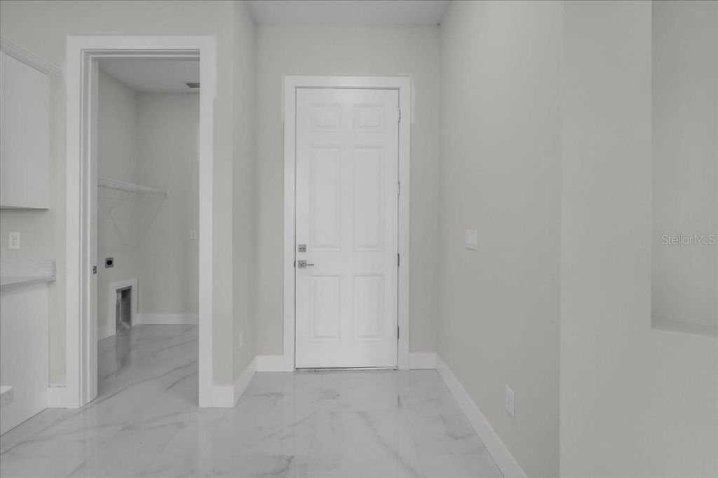 Photo of 1911 Richmond Avenue N, Lehigh Acres, FL 33972 (MLS # TB8511960)