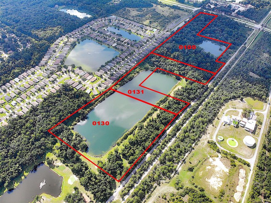 PERFECT FOR SOMEONE WITH A MOTOR COACH, ELECTRIC, WELL Includes 1531 Cow Creek Road, Parcel # 840500000131.  Property tax for both parcels for 2019 was $3,728.65 
Owner has used as private Florida retreat for years but has sold motor home. Terrific piece of property on approximately 22 acres including part of a lake! Lake is approximately 12.48+/- acres. Great development opportunity and zoned agricultural. Survey and area photos available see attached documents. There is a shell road leading to this property located just off the I-95 interchange on 442 leading into Edgewater. The state and county have recently approved acreage just to the west of this site for massive development, with homes, shopping, recreation, etc. The property is adjacent to the  Rails to Trails path. Excellent opportunity to acquire land that could have many uses such as homes RV park, etc. Beautiful lake serves as a centerpiece for this property. Currently there is only one home located on this section of the road and the road dead ends at this home. Easy exit and entrance to I-95, 4 lane highway from property to shopping and US 1. 20 minutes to Daytona and easy drive to the beach in New Smyrna Beach. Property is mostly cleared with wonderful large oaks scattered throughout this impressive acreage. The property is also in the center of the next growth area for both the city and the county. Surveys of the property and aerials are available along with information provided by both the City of Edgewater, Volusia County, and Department of Transportation. Adjacent landowners have expressed interest in being considered for inclusion in any plans for development. Property is in city of Edgewater, retains County Ag zoning, future city land use MU.; Cleared: Partial