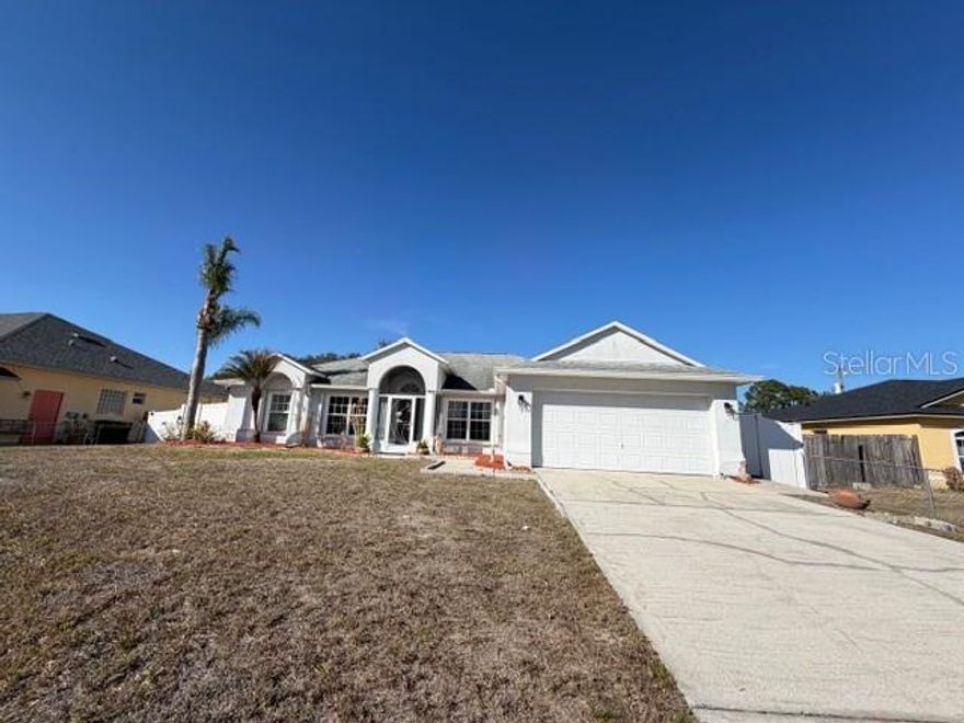 This spacious home sits in a quiet, well-kept neighborhood and offers a formal living room, dedicated study, and a comfortable family room. The interior features fresh paint and new bedroom flooring. The property is fully fenced in both the front and back and includes an enclosed sunroom/patio for year-round enjoyment. Built-in accordion shutters provide convenient storm protection. Located just minutes from the Bayside Lakes shopping center and nearby schools, this home combines comfort, convenience, and peace of mind.