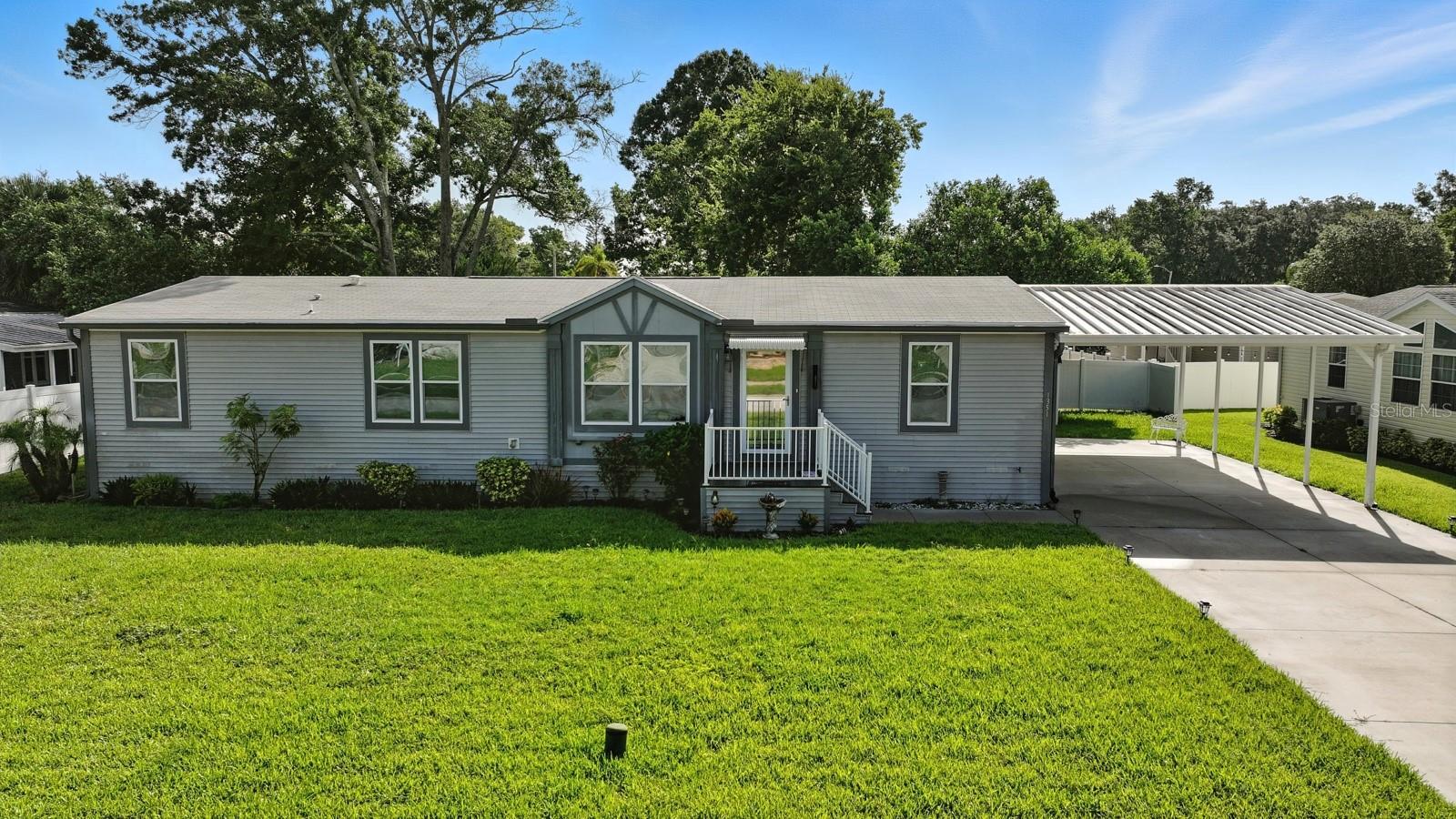 Fabulous Upgraded 3 Bedroom, 2 Bath Home on Double-Sized Lot – Built in 2020!
Welcome to this beautifully maintained and thoughtfully upgraded 3-bedroom, 2-bath home situated on an oversized double lot, complete with a wide 2-car covered carport. Built in 2020, this move-in ready home offers an open-concept floor plan, perfect for modern living and entertaining.
Step into the heart of the home – a stunning kitchen featuring a custom island with drop lights and a tray ceiling design. Sleek black appliances include an electric glass-top stove with a modern glass range hood, dishwasher, microwave, and refrigerator. A stainless steel farmhouse sink is perfectly positioned beneath a window overlooking the serene backyard. A stylish glass tile backsplash adds flair behind the stove, while abundant cabinets and generous counter space include a built-in desk area and a dedicated coffee cove.
The oversized indoor laundry room offers exceptional functionality with LG washer/dryer included, a pantry, and extensive storage.
The spacious living room features a custom whitewashed rough-wood plank accent wall with built-in shelf, cubbies, and special lighting. This area flows seamlessly into a dedicated dining space, both enhanced by wooden valance boxes over the windows.
All three bedrooms are generously sized, each with ceiling fans and walk-in closets. The primary suite is a true retreat, featuring a massive walk-in closet and a spa-like en-suite bathroom with double vanities, a separate makeup/vanity station, a private water closet, and a luxurious oversized shower with built-in bench, sliding glass doors, and elegant tile and glass inlay details.
Additional upgrades include a brand-new HVAC system installed in 2024, elegant crown molding, and high ceilings throughout the home. Luxury vinyl plank flooring enhances the kitchen, dining room, laundry room, and bathrooms, while plush carpeting adds comfort to the living area and all three bedrooms. Every window is fitted with faux blinds and has been solarized for improved energy efficiency. The home also features in-wall hidden cable and internet wiring, and all utilities are located underground for a clean, unobstructed exterior.
The beautifully landscaped yard features an irrigation well and sprinkler system to keep everything green year-round. A storage shed/workshop with an upper-level storage area in the backyard offers plenty of space for tools and equipment, while partial vinyl fencing provides added privacy. For peace of mind, a portable gas generator (Yamaha - 120 cap) is included with a meter hookup and cable that connects to the outside electrical panel.
This home is filled with thoughtful upgrades and showcases true pride of ownership. Don’t miss the chance to make this exceptional property your own!