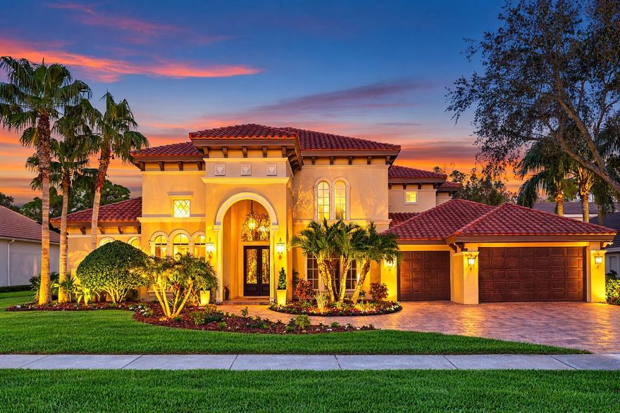 Privately nestled within the highly sought-after Quail Lake community, this extraordinary custom-built Mediterranean sanctuary offers an exceptional blend of timeless architecture, Luxury finishes, and resort-style living. Encompassing 5,510 square feet of thoughtfully designed living space, this remarkable residence features 4 bedrooms, 4 full baths, a private office, a rear den, a distinguished library, and a versatile second-level media and entertainment suite. A custom, artisan-crafted double-entry door with intricate scrollwork detailing welcomes you into an impressive interior highlighted by soaring 22-foot ceilings, expansive floor-to-ceiling windows, custom curved walls, and exquisite stone flooring. The elegant formal living and dining rooms create the perfect setting for entertaining, while the thoughtfully designed layout offers multiple private spaces, including a front study, a tranquil library, 2 overlook balconies, and a spectacular two-storey rear den with a grand, domed octagonal rotunda ceiling. The chef’s kitchen is a true centerpiece of the home, meticulously designed with Quartz countertops, a gas cooktop with griddle, custom stone hood vent, TopZero sink, coffee bar, walk-in pantry, second refrigerator, pull-out drawers, and a stunning framed Oyster Pearlescent backsplash. Extensive custom cabinetry provides abundant storage, while an adjacent closet offers the opportunity to create a temperature-controlled wine cellar. The main-level primary suite is a luxurious retreat, complete with French doors providing private access to the pool and outdoor terrace. The spa-inspired ensuite bath features dual custom walk-in closets with built-in shelving systems, a freestanding Volcanic Limestone soaking tub, a zero-entry walk-in shower, and a private water closet with Toto bidet. Upstairs, a spectacular media and entertainment room with surround-sound speakers offers incredible flexibility as a movie theater, game room, bonus room, teen retreat, or private in-law suite. This impressive space is equipped with a wet bar, kitchenette with mini dishwasher, custom-built cabinetry, a projector with media screen, and custom shelving/storage designed for ultimate comfort and entertainment. Additional bedrooms are generously sized, while the home’s extensive architectural details—including an extraordinary collection of ceiling treatments, crown molding, and built-in niches for art displays—enhance its distinctive character throughout. Outdoor living is equally captivating with a beautifully designed patio and expansive seating areas overlooking the sparkling resort-style pool, complete with solar heating and a smooth pebble finish interior. Lush landscaping, exterior lighting, and a private well for irrigation add to the home's thoughtful design and efficiency. Additional premium features include high-end stone and wood flooring, upgraded lighting and plumbing fixtures, three HVAC systems with a dedicated zone for the primary suite, pre-wiring for two electric vehicles, whole-home networking, and 3M window tinting on many windows for comfort and energy efficiency. Residents of Quail Lake enjoy access to outstanding community amenities, including a YMCA, gated park area, pavilion, recreational fields, basketball, pickleball, and volleyball courts, soccer field, walking trails, playgrounds, and scenic outdoor spaces, including Lake Tarpon - boat ramp and access —all just minutes from Lansbrook Golf Club. Luxury living redefined.