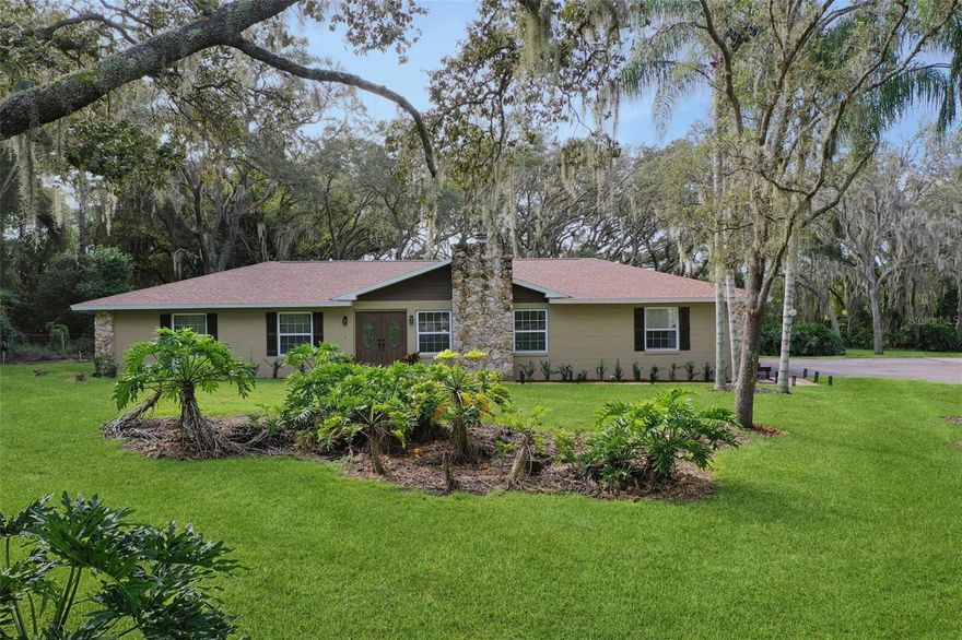 This home in the rural community of Lake Avalon features a beautiful 2+ acre property with mature oaks with
fresh landscaping, long paved driveway, and a separate workshop/barn or possible 6+ car garage with
separate electric meter. A 3 bedroom 2 bathroom plus office with a large Florida room, gas burning fireplace,
and large kitchen with wood cabinetry and center island which are all wonderful features of this country home.
Brand new roof and newer AC with a freshly painted interior. This community features one of the best locations
in the county with a rural feel yet close to amenities and easy commute routes. This community prides itself
with rural protection from the county with an Agricultural zoning which allows small farming, horses and
livestock, and opportunity for an ADU building approval. Schools in the area are top rated. Property is fully
fenced with a smart gate opener and fully irrigated. Own your piece of Florida paradise!