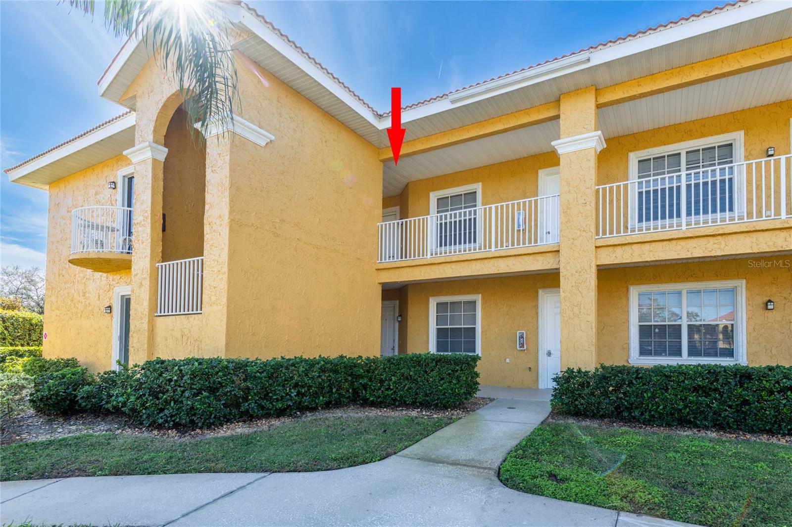 $10,000 PRICE ADJUSTMENT FOR this upgraded, stunning 1 Bedroom, 1 Bath condo is located within the Caliente Clothing Optional/Nudist Resort in Land O Lakes, Florida. The functional eat-in kitchen features beautiful wood cabinetry, Corian countertops, and stainless steel appliances and custom sink faucet. Fully furnished and move-in ready. The owners just purchased a $4,000 Purple (manufacturer) mattress in August, 2024 and a beautiful matching leather couch and recliner in October, 2024 for $3,000. The closet cabinet was upgraded in 2023, and the electric fireplace in December 2024. You'll find custom shutters on all windows and a custom blind on the sliding glass door. There are upgraded ceiling fans and full size washer/dryer. New HVAC in 2004 and a retractable screen door on the front entrance door. The covered and screen lanai is tiled and overlooks the lush landscaping, plus a private entrance from the Master bedroom. The flooring is custom engineered plank wood. The bathroom features a high-end Toto toilet with a seat warmer, bidet, dryer, pre-rinse, and auto-open, auto-close, and auto-flush functionality, all controlled via remote for ultimate comfort, convenience, and sanitation. Separate linen closet plus an oversized walk-in closet. Caliente community and Resort offers access to a laundry list of amenities and activities, including a Restaurant, Tiki Bar, Sauna, Oversized Hot Tub, Pickle Ball/Tennis Courts, 2 Water Volleyball Pools, 24 Hour Fitness Center, Oversized Conversation pool, Sand Volleyball Courts, Sports Bar, Yoga Room, Lagoon Pool w/ Waterfall, Outdoor Showers, Steam Room, with additional required membership fee to the resort. This unit is presently in Caliente's rental pool and can remain, or removed. This condo is gorgeous and can be used to live in fulltime, vacation home, or lease when do using it through the rental program. Lots of options and priced to sell at just $225,000.