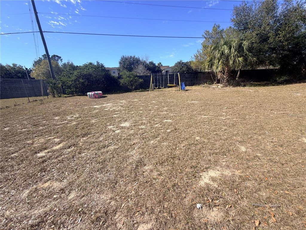 Photo of 7413 Navel Tree Court, Orlando, FL 32818 (MLS # TB8469727)