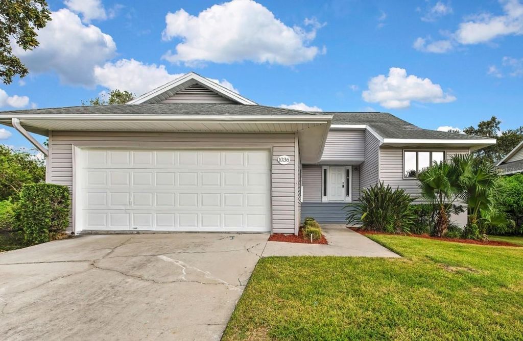 Photo of 1036 Lake Avoca Drive, Tarpon Springs, FL 34689 (MLS # A4659734)